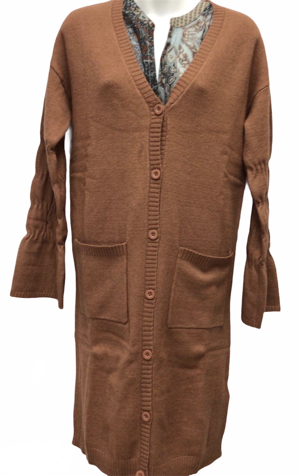 Cardigan / manche bouffante avec détail / poche 