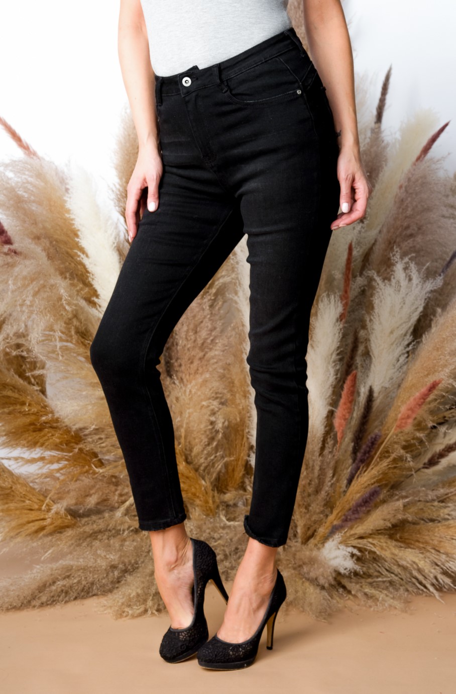 Jeans ajusté extensible / poches arrière 